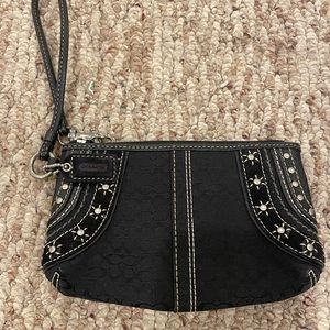 Coach wristlet with rivet detail